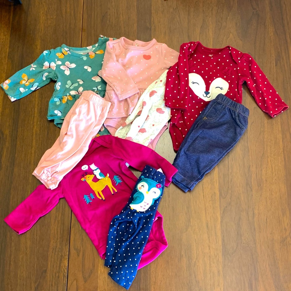 Lot of matching Carter’s baby outfits